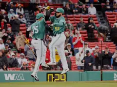 Rafael Devers’ RBI single sends Boston past Baltimore 6-5 in 10 innings in DH opener
